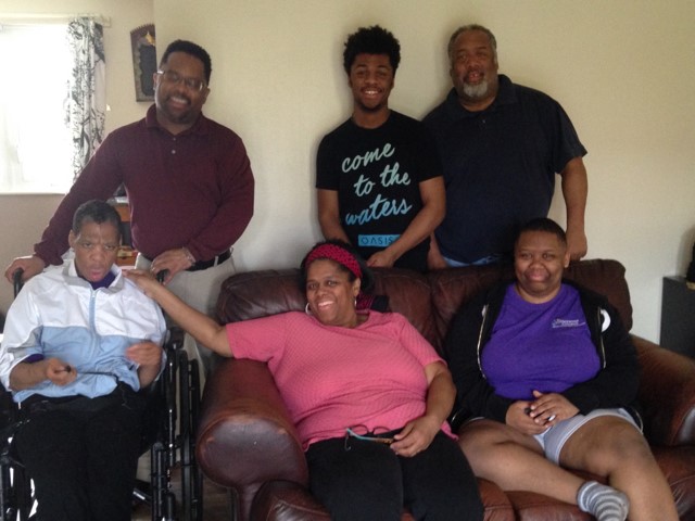 Caryl and her family in her home. From bottom left: Caryl, Cathy Jordan (Caryl's sister) and Corinne (Caryl's niece and roommate)  Top from left: Carl Vaugh Mason (Caryl's brother), Devon Jordan, (Caryl's nephew) David Jordan (Caryl's brother-in-law)